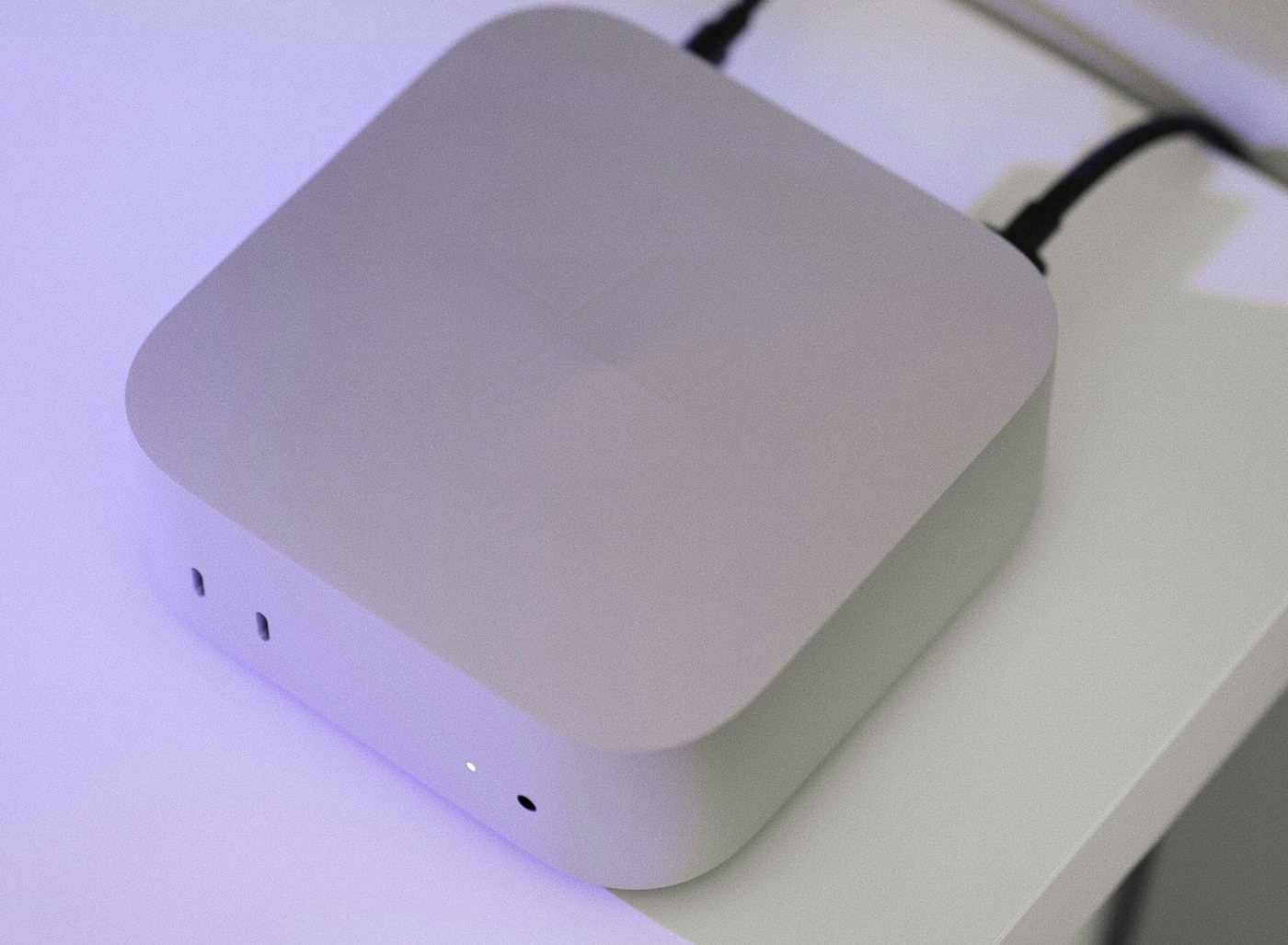 A small desktop computer on an office shelf